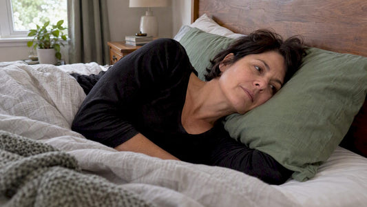 Woman checking neck alignment on a pillow