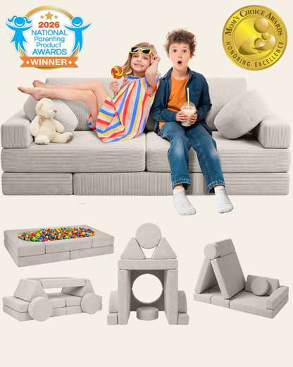 A children's modular play couch set shown with two kids sitting on it.